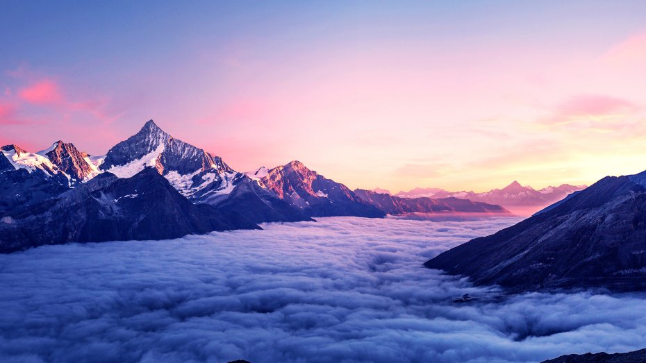 阿尔卑斯山朝霞云层海银装山峦风光电脑壁纸